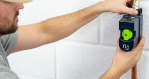 guy installing a water shut off valve